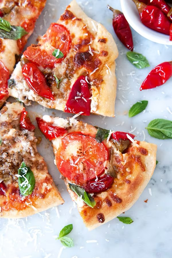 Calabrian Pepper Pizza With Mascarpone And Italian Sausage
