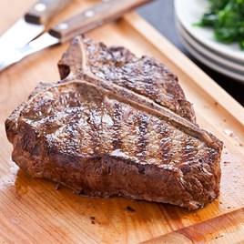 Grilled T-Bone Steaks with Lemon-Garlic Spinach

